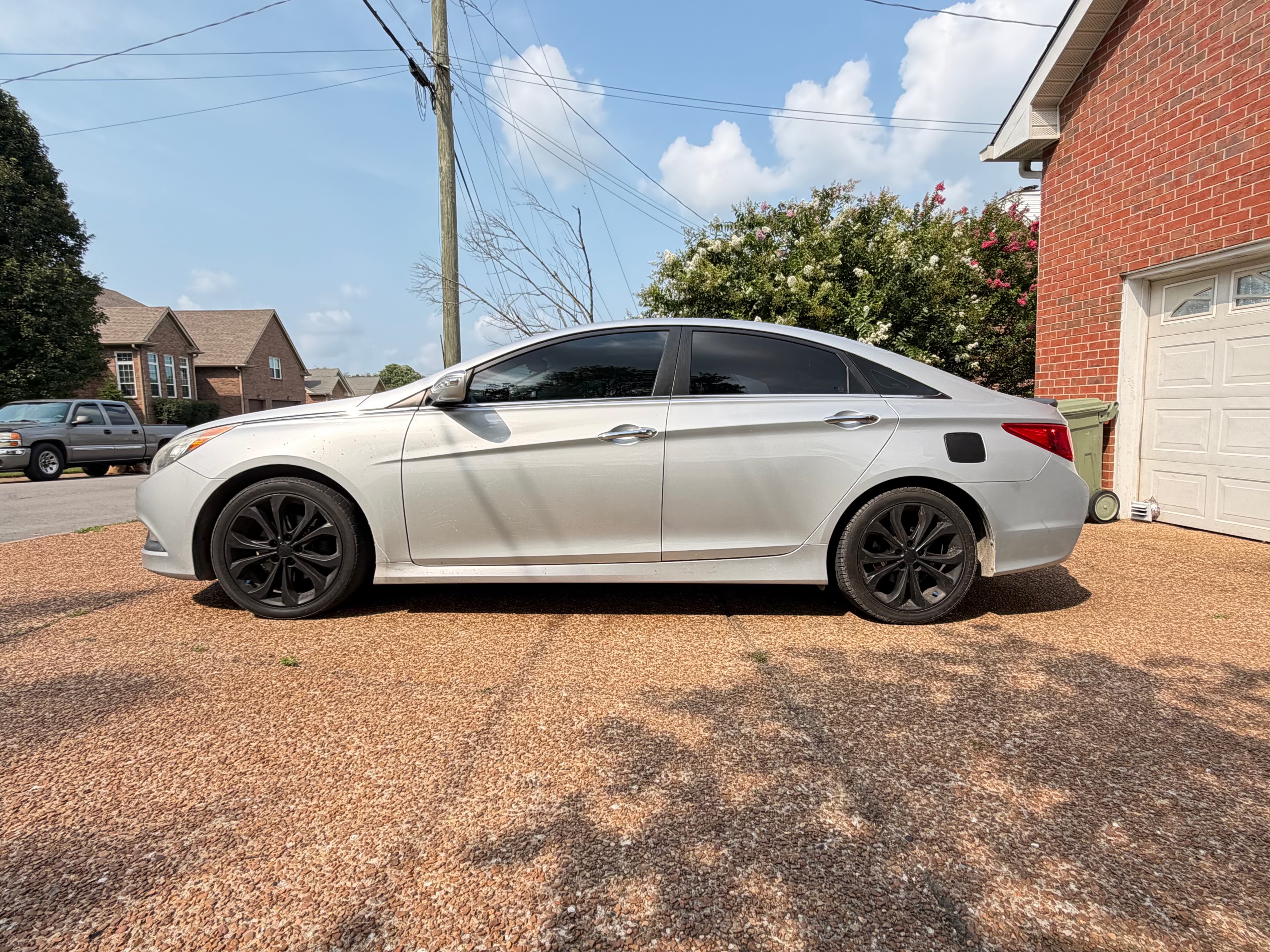 Silver sedan before detailing