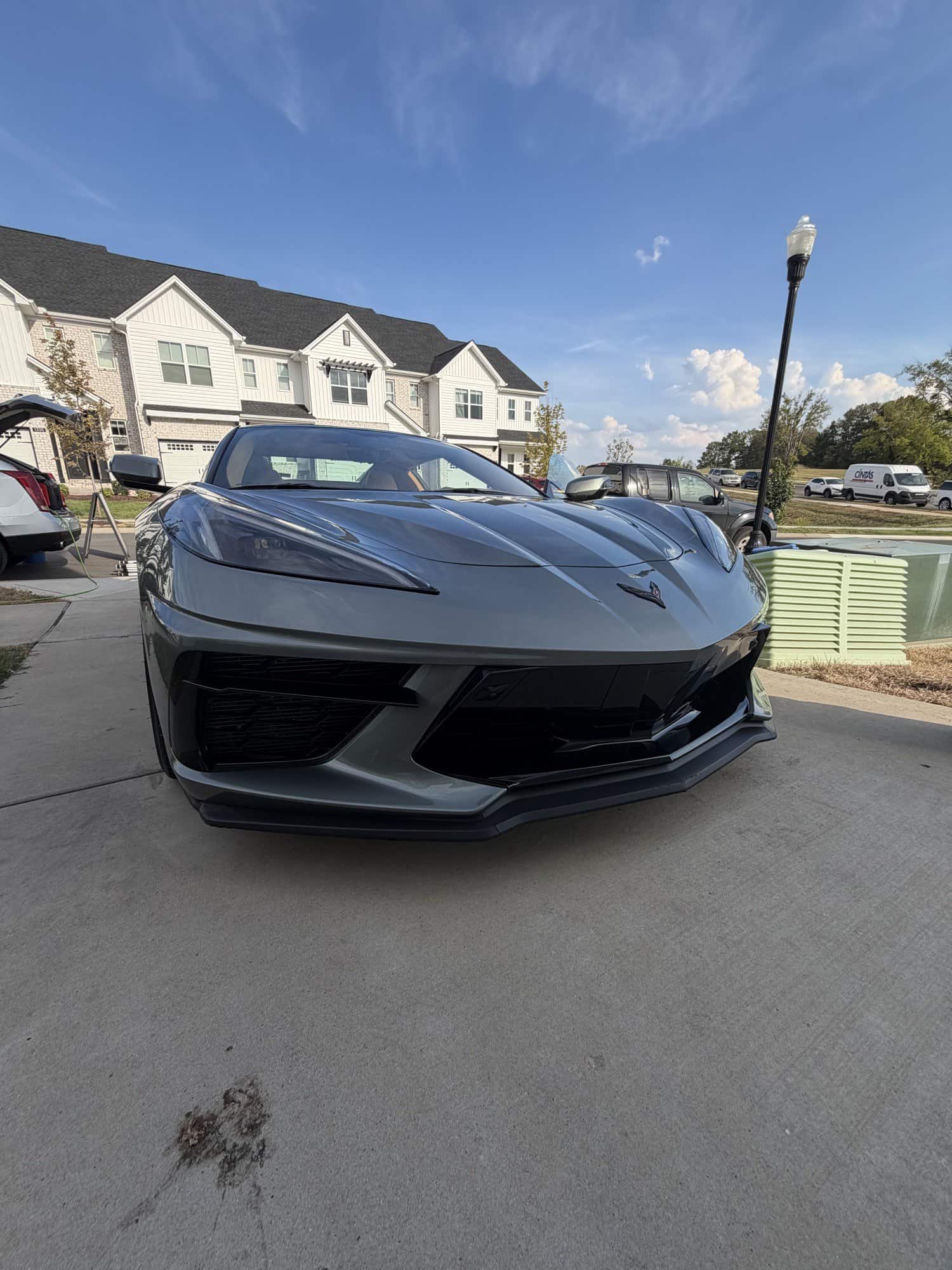Low front view of a gray Corvette C8