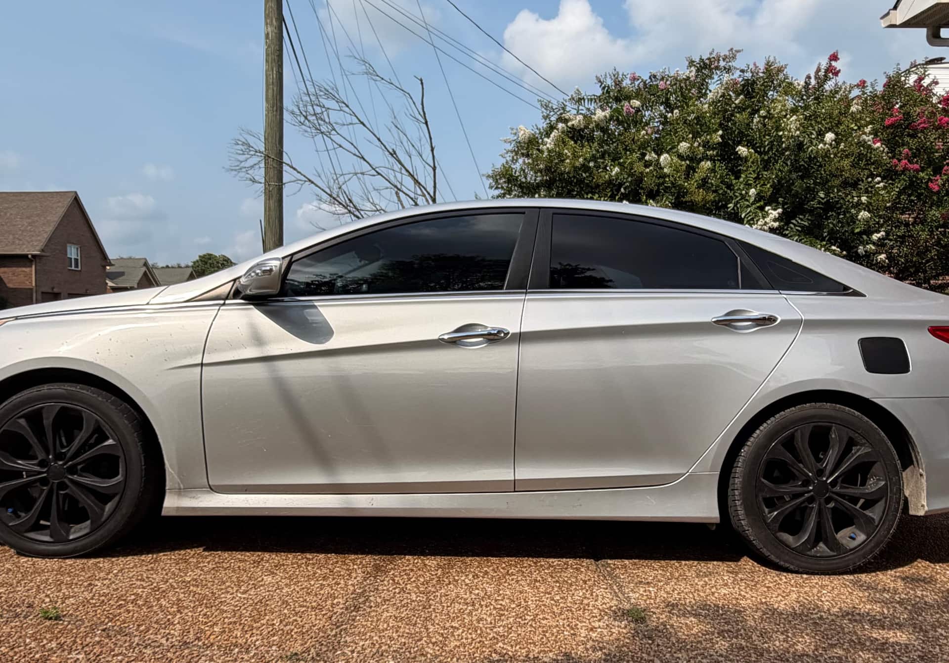 Silver Hyundai Sonata side view before a wash