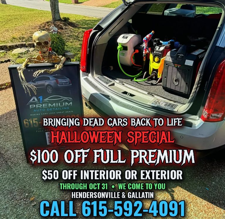 A1 sign and detailing gear in the back of a Cadillac SRX
