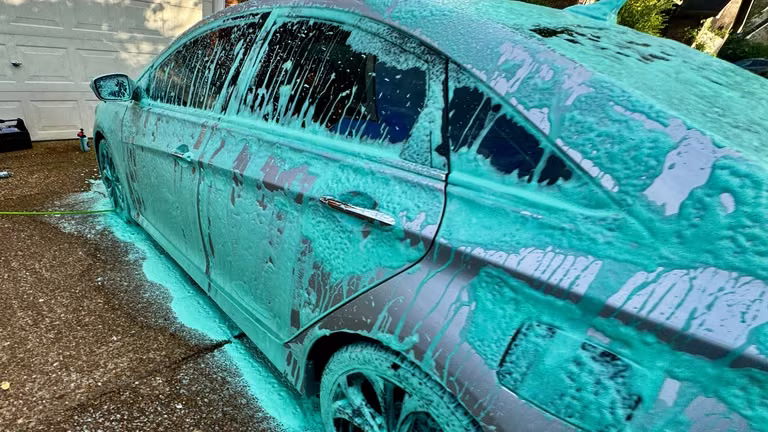 Hyundai Sonata covered in teal foam