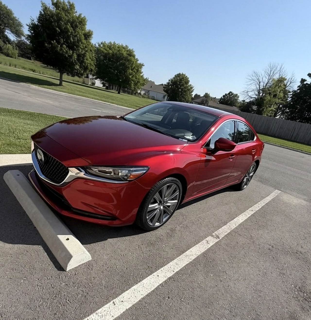 Red Mazda6 after a wash